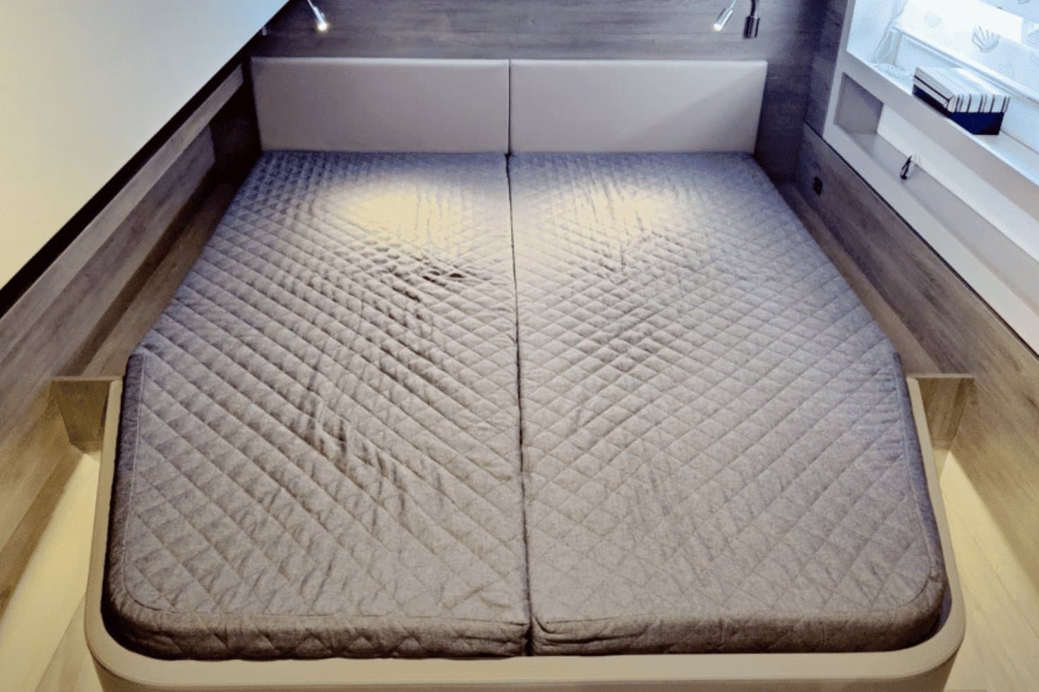 Cabin bed on the catamaran “Princess Vera”